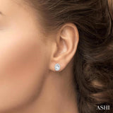 5x3 MM Oval Shape White Topaz and 1/8 Ctw Round Cut Diamond Halo Semi-Precious Stud Earrings in 10K White Gold