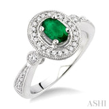 6x4 MM Oval Cut Emerald and 1/5 Ctw Round Cut Diamond Ring in 14K White Gold