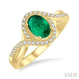 1/5 Ctw Bypass Split Shank 7X5 MM Oval Cut Emerald and Round Cut Diamond Precious Ring in 14K Yellow Gold