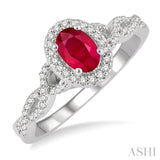 1/5 Ctw Oval Shape Split Entwined Shank Round Cut Diamond Precious Ring With 6x4 MM Oval Cut Ruby Center Stone in 10K White Gold