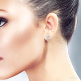 1/10 Ctw Bold Twisted Rib Round Cut Diamond Pirouette Bold Fashion Stud Earrings in Sterling Silver